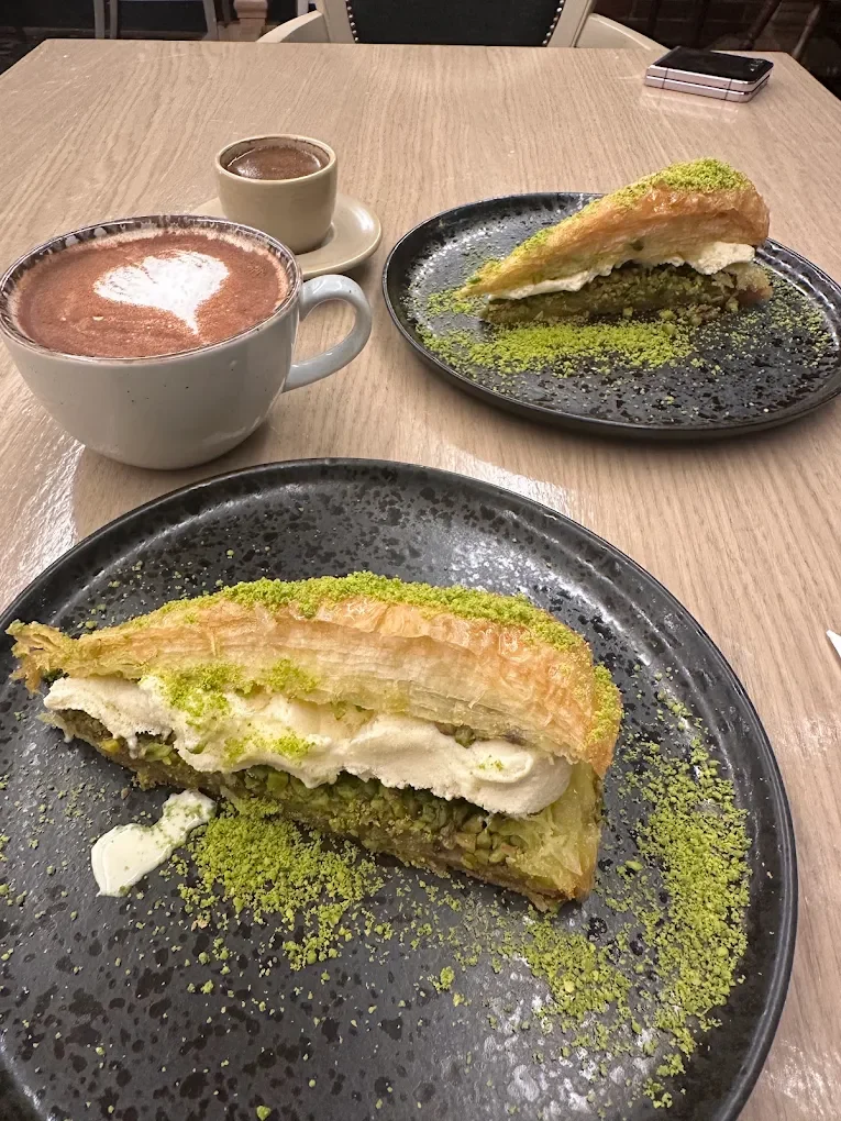 Pistachio baklava with a hot chocolate and Turkish coffee